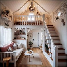 a living room filled with furniture and a staircase