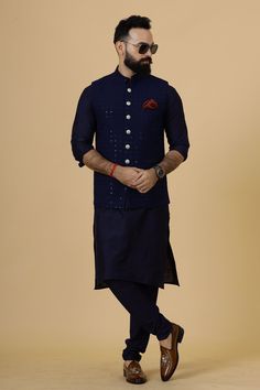 Important Instructions : We request you to kindly calculate the processing time of your order  after the mutual confirmation on Bespoke measurements between us has taken place (either via message , e mail or form) "Crafted with Passion in India; loved by men across the USA, Canada, Europe" Product Specifications : Material: Chikankari Silk Color: Navy Blue Jacket with Navy Blue Kurta Pajama Collar type: Mandarin Jawahar Jacket With 6 Buttons in Front Package contents: 1 Half Jodhpuri Jacket + 1 Designer Indigo Sets With Chikankari Embroidery, Indigo Set With Chikankari Embroidery, Indigo Sets With Chikankari Embroidery, Indigo Kurta With Zari Work For Diwali, Blue Chanderi Bandhgala For Wedding, Indigo Traditional Wear With Chikankari For Festive Occasions, Indigo Traditional Wear With Chikankari Embroidery For Diwali, Festive Indigo Traditional Wear With Chikankari Embroidery, Festive Indigo Sets With Zari Work