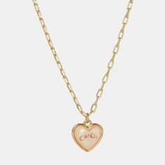 Coach Signature Heart Chain Necklace In Gold/ Pink Brand New! Details: ~ Plated Brass And Enamel ~ Lobster Clasp Closure ~ Adjustable 16" - 18" (L) ~ Style No. C9469 Coach Rose Gold Jewelry For Gifts, Coach Heart Charm Heart Jewelry, Coach Heart Charm Jewelry, Coach Elegant Heart-shaped Jewelry, Coach Elegant Heart Jewelry, Elegant Coach Heart-shaped Jewelry, Elegant Coach Heart Shaped Jewelry, Coach Gold Heart-shaped Jewelry, Coach Heart-shaped Gold Jewelry