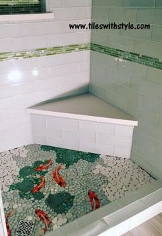 there are fish swimming in the bathtub with rocks and pebbles on the bottom floor