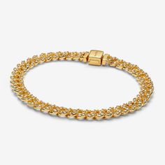 Elevate your look with the Pavé Cuban Chain Bracelet. This 14k gold-plated bracelet features sparkling links in a chain. The top of each half circle is set with three round stones, while the back of the chain is polished for shine and comfort. The bracelet closes with a flat, square-shaped clasp featuring an engraved Pandora logo. - Pandora Pavé Cuban Chain Bracelet - 14k Gold-plated unique metal blend / Cubic Zirconia / Clear - Sz. 7.9 in Charms Disney, Pandora Pave, Pandora Logo, Pandora Essence, Cuban Chain Bracelet, Cuban Bracelet, Small Bra, Bracelet Tennis, Bracelet Pandora