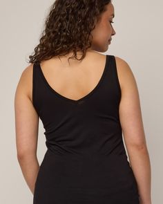 The women on our team can’t get enough of this tank. A layering piece that is comfortable, versatile, and has more length than other tanks you’re used to—made for tucking in or skimming the body for added coverage under other garments. Reversible front to back, allowing for either a scoop neck or v-neck option. Flatlock seams and just-right 1” width straps make it your most functional, everyday tank top. We recently updated this style (November 2023) to be a true slim layering tank. Chest, waist Versatile Seamless Tops For Layering, Seamless Athleisure Tops For Layering, Versatile Solid Color Bra Friendly Top, Black Tank Top With Built-in Bra For Loungewear, Versatile Bra Friendly Top, Versatile Tops With Built-in Bra For Layering, Versatile Seamless Cami Top, Sporty Black Cami Top, Tank Camisole For Layering