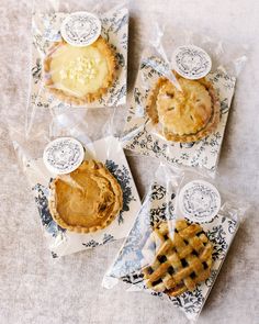 four different types of pies in plastic bags