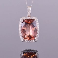 A gorgeous 39.82 carat morganite accented with 1.57 carats of white diamonds. All set in 18k white gold. Dimensions are 48.3mm x 27.5mm x 14mm Classic White Gold Morganite Jewelry, Exquisite Formal Morganite Jewelry, Luxury Morganite Gemstone Jewelry, Fine Jewelry Morganite With Brilliant Cut, Elegant Morganite Gemstone Jewelry, Formal White Gold Morganite Jewelry, Luxury White Gold Morganite Jewelry, Luxury Morganite Jewelry In White Gold, Elegant Morganite Jewelry