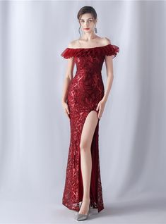 Naturally commanding attention, this prom dress is the epitome of bold sophistication. The rich, red lace overlays speak volumes of untold stories, each stitch a word in the language of elegance. The off-shoulder design accentuates a timeless beauty, while the layered ruffle adds a touch of playful charm. The daring slit is a pathway to confidence, empowering the wearer to stride forth with grace and strength. This is not merely a dress but a statement piece that resonates with the rhythm of the heart, a symphony sewn into fabric, a piece that transforms the ordinary into the extraordinary with its enchanting allure. One Shoulder Dress Long, Hydrangea Print, High Low Gown, Mermaid Sequin, Sequin Prom Dress, Casual Wedding Dress, Fringe Dress, Feather Dress, Dress Gift