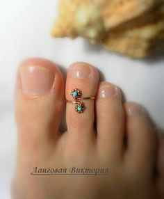 Ring on the toe. Made of silver 925 wire with brass fittings and natural turquoise. Size is adjustable. In the package You will receive one ring for the toe, which select from the options. Bright rings on the toe - very original jewelry for summer, beach season, perfect for every day, Bohemian Turquoise Toe Ring As Gift, Dainty Adjustable Nickel-free Toe Rings, Dainty Nickel-free Open Toe Rings, Dainty Nickel-free Toe Rings, Handmade Turquoise Toe Ring As Gift, Handmade Turquoise Toe Ring For Gift, Adjustable Dainty Toe Rings As Gift, Adjustable Dainty Toe Rings For Gift, Minimalist Toe Ring Jewelry For Beach