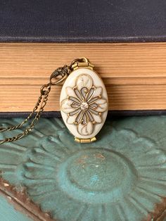 For yourself or someone you love... Timeless and classic, this gorgeous Antique brass filigree locket will become a special addition to your jewelry collection. The locket opens to the side to reveal 4 places, Glue on photos or keep a secret note locked away, close to your heart. SIZE: Oval locket: approx 32mmx20mm You can select a LENGTH you like! I also have another vintage silver locket with dragonfly here: https://www.etsy.com/listing/173498129/ Happy customers said this: AMAZING! The photo Victorian Style Nickel-free Necklace For Weddings, Victorian Nickel-free Wedding Necklace, Victorian Wedding Necklace Nickel-free, Victorian Wedding Necklace Nickel Free, Victorian Style Nickel-free Wedding Necklace, Elegant Handmade Antique Gold Locket Necklace, Nickel-free Brass Locket Necklace For Wedding, Antique Adjustable Locket Necklace, Antique Gold Victorian Jewelry Gift