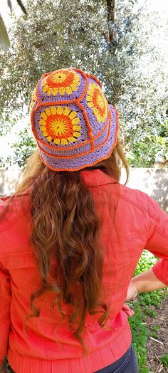 NEW SPRING/SUMMER CREATION Lilac and orange colored granny square floral crochet bucket hat. Cute and stylish granny square bucket hats hand crocheted with trendy color palettes in 2024. ✔️ DESIGN: These hats are  great for spring /summer, holidays, and festivals. They have stylish look in vintage, boho style, great with any outfit, suited for outdoor activities, and casual wear in bright colors .They are a nice treat for yourself, as well as thoughtful presents for friends or valentines. ✔️ QUA Trendy Crochet Sun Hat For Spring, Trendy Orange Bucket Hat For Summer, Trendy Orange Summer Bucket Hat, Yellow Bohemian Crochet Hat For Spring, Retro Crochet Bucket Hat For Vacation, Orange Brimmed Bucket Hat For Spring, Orange Bohemian Hat For Spring, Bohemian Orange Hat For Spring, Bohemian Orange Sun Hat For Spring