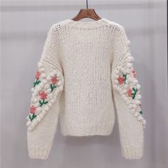 Style: CasualMaterial Composition: Cotton polyester spandexDecoration: RuchedPattern Type: FloralClothing Length: RegularCollar: O-NeckOrigin: CN(Origin)Season: WinterSleeve Length(cm): FullSleeve Style: RegularMaterial: PolyesterThickness: Thick （Winter)Closure Type: Single BreastedGender: WOMENModel Number: sls8581Age: Ages 18-35 Years Oldseason: spring,autumn,winterSleeve: long sleevestyle1: women autumn and winter sweater V-neck Top With Floral Embroidery For Winter, Fitted Bohemian V-neck Sweater, Long Sleeve Knit Cardigan With Floral Embroidery, Knit Long Sleeve Cardigan With Floral Embroidery, Knit Cardigan With Floral Embroidery And Long Sleeves, White Floral Embroidery Winter Sweater, White Winter Sweater With Floral Embroidery, White Floral Embroidery Sweater For Winter, Trendy Embroidered Knit Sweater