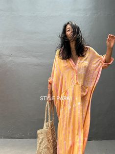 Jimbaran dress  is an oversized long sleeve soft rayon voile Long shirts  dress  .  This Oversized shirt dress is designed to flatter every body type and fit numerous occasions. 👍Included tali - f e a t u r e s - - Relaxed fit - Front pockets Fabric: 100% Soft rayon voile  Style:oversized fit Color:Bali Hand tie dyed peach & multi motif Wash :Hand cool wash  - measurement -  - One size  -  I recommend American size M to XL Chest /164cm/ 64inch(round) Length/135cm/53inch Transparent - it's  tran Fall Beach V-neck Shirt Dress, Summer Long Sleeve Tunic For Brunch, Long Shirt Dress For Beach In Fall, Spring Oversized Shirt Dress For Brunch, Flowy Long Sleeve Dresses For Beach Cover-up, Oversized Shirt Dress For Spring Brunch, Long Sleeve Shirt Dress For Spring Beach, Bohemian V-neck Shirt Dress For Summer, Summer Long Sleeve Shirt Dress With Relaxed Fit