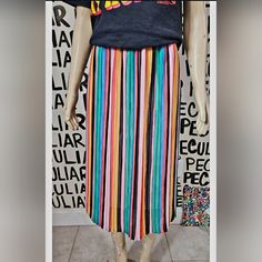 Never Worn,Multi Colored Striped Midi Skirt With Elastic Waist. Very Similar To The One Kelly Clarkson Wore With A Rolling Stone Tee Shirt Which Gave An Edgy Effect. Trendy Multicolor Pleated Skirt, Trendy Multicolor Mini Skirt, Casual Striped Pleated Bottoms, Trendy Pleated Beach Skirt, Retro Multicolor Pleated Skirt Bottoms, Retro Striped Summer Skirt, Summer Retro Striped Skirt, Retro Striped Skirt For Summer, Casual Multicolor Mini Skirt