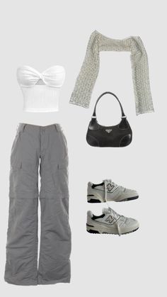 a white top, grey pants and black purse are arranged in the shape of a woman's outfit