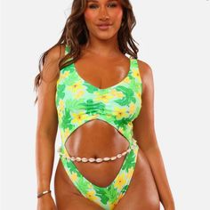 New Best-Selling One-Piece Style! The Monokini Looks And Feels Good On Everyone! If You Don’t Have A Monokini, It’s Time To Find Out What The Fuss Is All About! Reversing Into A Gorgeous Green, This Will Be A Best-Seller. Supportive Style Tummy And Back Cut-Out Feature Seamless And Reversible Contouring And Flattering Currently $99 On Their Website Without Shipping, Only Tried On. Green One-piece Beachy Swimwear, Beachy Green One-piece Swimwear, Green One-piece Swimwear With Tropical Print, Vacation Swimwear With Cutout Triangle Top, Cutout Swimwear For Beach Party Season, Beach Party Swimwear With Cutout, Beachy Tropical Print Swimwear For Summer Parties, Cutout Triangle Top Swimwear For Vacation, Triangle Top Swimwear With Cutout For Vacation