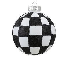 a black and white checkered ornament hanging from a string