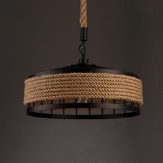 a chandelier with rope hanging from it