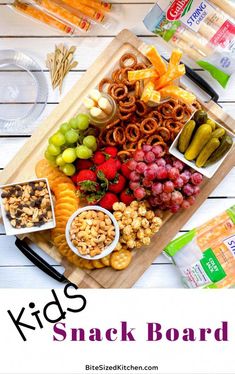 kids snack board with fruit and snacks on it