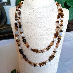 Gorgeous Long Newly Made Gemstones Pearls And Crystals Necklace-Trendy Long, Made With Quality Materials And Toggle Clasp. Wear It Fashionably Long Or Double Down For A Classic Style. Tiger Eye, Pearls And Hand Polished Crystals. This Color Combination Goes With A Lot Of Things. Elegant Brown Crystal Necklace With Adjustable Fit, Elegant Adjustable Brown Crystal Necklaces, Elegant Brown Crystal Necklace, Elegant Brown Crystal Necklaces With Natural Stones, Elegant Brown Crystal Necklace With Gemstone Beads, Elegant Brown Necklace With Stones, Eye Pearls, Polished Crystals, Crystals Necklace