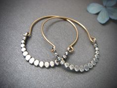 beaded minimalist ... mixed metal hoops by sirenjewels on Etsy https://www.etsy.com/listing/516087047/beaded-minimalist-mixed-metal-hoops Hoop Earrings Style, Alloy Earrings, Beaded Hoop Earrings, Ear Jewelry, Minimalist Earrings, Silver And Gold, Metal Beads, Handmade Earrings, Handcrafted Jewelry