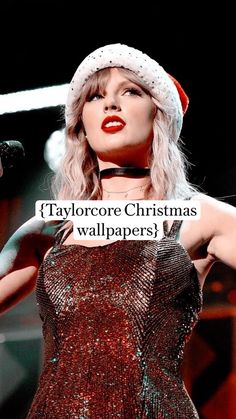 taylor swift holding a sign that says i can't wait for it to be christmas sorry for cover my wife