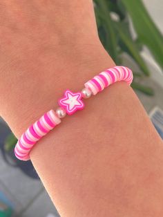 Cute pink clay bead bracelet with pink and white star Trendy Pink Star Bracelet, Pink Polymer Clay Jewelry With Heart Beads, Pink Star-shaped Beaded Bracelets, Handmade Pink Polymer Clay Bracelets, Cute Pink Star-shaped Bracelets, Adjustable Pink Star Bracelets, Pink Polymer Clay Jewelry With Colorful Beads, Pink Jewelry With Colorful Beads In Polymer Clay, Handmade Pink Polymer Clay Beaded Bracelets