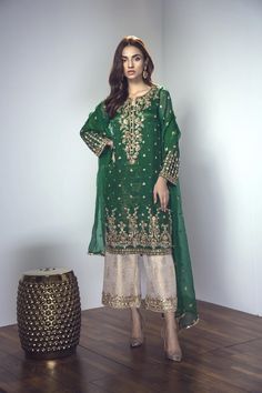 Intricate zardozi embroidery in gold on chiffon shirt. Pants will be gold jamawar fabric with golden gotta lace on hem. It comes with chiffon dupatta with gotta lace and chan motifs. Brocade pants print design may vary silghty Color of this outfit can be changed. Custom sizing is free of cost. Please inbox me if you like to get a measurement form. Embroidery and stitching will take 6-7 weeks. Shipping will take 3-5 days  If you need it urgently message me. Silk Palazzo Set With Gold Embroidery For Eid, Gold Silk Palazzo Set With Traditional Drape, Traditional Palazzo Set With Gold Embroidery For Festivals, Eid Palazzo Set With Gold Embroidery And Straight Kurta, Traditional Palazzo Set With Gold Embroidery For Eid, Traditional Gold Embroidery Palazzo Set For Festive, Traditional Gold Embroidery Palazzo Set For Festive Occasions, Gold Silk Palazzo Set For Diwali, Gold Chanderi Palazzo Set With Traditional Drape