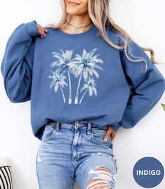 🌴Discover our Tropical Palm Tree crewneck sweatshirt!🌴 This Trendy Palm Tree sweater features a watercolor graphic. It is super soft and comfortable and would look great with either shorts or jeans. Size up 1-3 sizes for an oversized beach cover up. Makes a nice gift for Mother's Day, a Birthday or a Palm Tree lover! Comes in 9 pretty color!.🏝️ ✨PRINT: This is a handmade, Direct-to-Garment printed item. The designs are professionally printed directly on to the shirt. All over printing is used Tree Sweater, Tree Lover, Summer Beach Vacation, Watercolor Graphic, Tree Shirt, Tropical Palm, Pretty Colours, Summer Shirts, Summer Girls