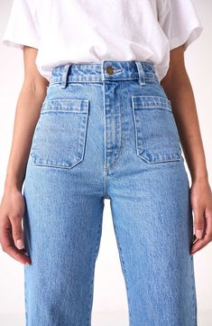 Fall for the silhouette of these high-waist jeans made from stretch-kissed denim in a light-blue wash with retro patch pockets and wide ankle-grazing hems. 28" inseam; 23" leg opening; 12 1/2" front rise; 14 1/2" back rise (size 29) Zip fly with button closure Five-pocket style 99% cotton, 1% elastane Machine wash, line dry Imported Petite Mom Jeans High Waist, Merricks Art Jeans, Roll Up Straight Leg Jeans, Other Stories Favorite Cut Jeans, Can You Cuff Straight Leg Jeans, Shea Mcgee Jeans, Charlotte Jeans, Lily Blue, Sailor Jean