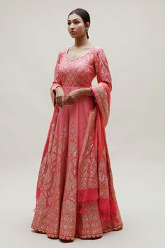 Peach floor length attached can-can anarkali with all over bandhani and floral pattern and gota patti neckline. Comes along with intricate shikari bandhani banarasi dupatta in pure georgette.
Components: 2
Pattern: Woven, Embroidery
Type Of Work: Bandhani, Floral
Neckline: Round Neck
Sleeve Type: Three Quarter Sleeves
Fabric: Georgette
Color: Peach
Other Details: 
Anarkali:
Length: Approx: 56-58 inches
Attached can-can
Back cut-out detailing with heart tassels
Dupatta:
Floral pattern with tassel Anarkali Salwar Kameez With Pallu, Floor-length Cutdana Salwar Kameez For Reception, Art Silk Anarkali Set With Chikankari Embroidery, Bollywood Anarkali Set With Chikankari Embroidery For Reception, Bollywood Style Transitional Anarkali For Reception, Straight Kurta Anarkali Set With Pallu, Anarkali Set With Straight Kurta And Pallu, Traditional Maxi Length Churidar With Sheer Dupatta, Floor-length Anarkali Set For Eid