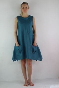 "Handmade teal linen dress sleeveless, perfect for casual wear and suitable for any occasion in summer season Details: - 100% natural linen produced in Europe ; - medium weight (180 gram per square meter); - color: teal, could be any from our colors catalogue (color samples at the photo); Made to order, approximately a few days, If you have any questions please message me and I will be glad to answer. Size guide : Size XS Bust: fits bust around 33\"-34\"/ 84-88 cm Waist: fits waist around 25\"-2 Blue Sleeveless Dress With Pockets For Summer, Summer A-line Sundress With Pockets, Summer A-line Midi Dress With Pockets, Turquoise Mini Dress For Summer, Blue Cotton Sleeveless Dress With Pockets, Sleeveless Turquoise Sundress For Summer, Knee-length Sundress With Pockets, Turquoise Sleeveless Sundress For Summer, Casual Turquoise Cotton Dress