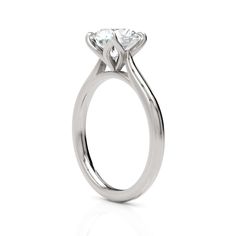 A beautiful Engagement ring in gold or platinum that includes a Colorless Round Moissanite set into the 4 prongs tulip setting. This solitaire ring is designed to allow the wedding band to sit close and flush with the engagement ring because the center stone sits directly above the band. Most of my items are made to order and will ship within 14-21 business days after the payment has been processed. If there are any delays I will contact you immediately. If you have a rush order contact me and I Gray Moissanite, Gold Wedding Jewelry, Forever One Moissanite, Floral Ring, Beautiful Engagement Rings, Round Moissanite, Ring Dainty, Engraved Items, Bridal Set