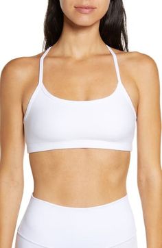 Slim racerback straps enhance the sporty, modern style of a space-dyed sports bra that's ideal for medium-impact activities. 10 1/2" length (size Medium) Medium-impact support Lined 87% polyester, 13% Lycra® spandex Machine wash, tumble dry Made in the USA of imported fabric Women's Clothing Athleisure T-back Sports Bra With Seamless Construction, Sporty Sports Bra With Medium Support And Tank Straps, Sporty Medium Support Sports Bra With Tank Straps, Sporty T-back Sports Bra With Built-in Bra, Sporty Seamless T-back Sports Bra, Sporty Strappy Back Sports Bra For Light Exercise, Strappy Back Sports Bra For Training, Adjustable Straps T-back Sports Bra For Workout, T-back Sports Bra With Adjustable Straps For Gym