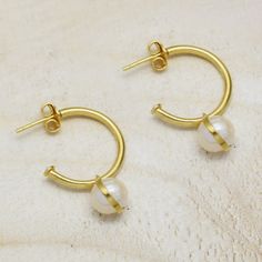 Pearl Gemstone Hoops Earrings, Handmade Fresh Water Pearl Earrings, Gold Hoop Earrings, Pearl Drop Earrings, Women's Jewelry, Christmas Gift, Brass Dangle Earrings, Thanksgiving Gifts, Gifts For Her, Handmade Earring, Designer Earring, Minimalist Jewelry, Unique Earring, Anniversary Gifts, Engagement Gifts, Gift For Women Since all our jewelry is well handmade with Natural semi-precious and some precious stones there will be imperfection, Color variation, Inclusion, and Natural Cracks on the Surface. All the above makes the jewelry look Authentic and Enhances its Character and Value. We provide same-day shipping for a maximum of all products but sometimes we need to make any design that's why any custom order can take up to 7 days. However, most of the products are usually available in sto Earrings Pearl Drop, Pearl Earrings Gold, Earring Minimalist, Unique Earring, Earrings Gold Hoop, Gemstone Hoop Earrings, Hoops Earrings, Jewelry Christmas, Earrings Pearl