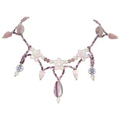 Vintage handmade necklace featuring beautiful designing of rose quartz and amethyst gemstones. This necklace is measured 16 inches long with lobster clasp. The necklace has also been checked for authenticity by a professional. Lavender Handmade Necklace, Handmade Purple Rose Quartz Jewelry, Handmade Pink Amethyst Necklaces, Pink Beaded Amethyst Necklace, Handmade Pink Amethyst Necklace, Wired Necklaces, Amethyst And Rose Quartz, Necklace Antique, Rose Quartz Necklace