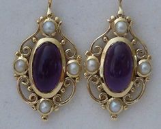 Vintage Amethyst Earrings 9ct 9k 10k Gold E14 pearl by GTJewellers Elegant Oval Earrings With Intricate Design, Victorian Oval Filigree Earrings, Victorian Filigree Oval Earrings, Victorian Hallmarked Pearl Earrings As Gift, 14k Gold Cabochon Earrings For Anniversary, Ornate 14k Gold Earrings, Ornate Yellow Gold Oval Earrings, Oval Filigree Earrings For Wedding, Oval Earrings With Intricate Design For Anniversary