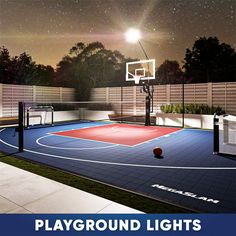 an outdoor basketball court at night with the words playground lights on it and a basket ball in the air