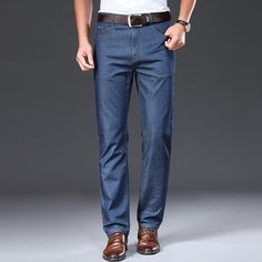 Elegant Straight Leg Jeans With Pockets, Elegant Straight Leg Denim Blue Jeans, Elegant Jeans For Fall, Elegant Denim Jeans For Fall, Elegant Denim Pants With Five Pockets, Denim Blue Straight Fit Jeans For Spring, Spring Denim Blue Straight Fit Jeans, Elegant Straight Leg Denim Jeans, Fitted Denim Blue Bottoms For Business Casual