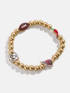 The Arizona Cardinals NFL Charm Bracelet is the ultimate accessory for die-hard football fans. Each bracelet is a celebration of your favorite team, featuring the Cardinals logo along with other charms related to the team and its iconic location. Perfect for game days or everyday wear, this bracelet adds a touch of sports-inspired elegance to any outfit. This bracelet features 6mm gold ball beads. This is an officially licensed NFL product. Football Fan Accessories, Cardinals Nfl, Arizona Cardinals, Bead Charm Bracelet, Football Fans, Cardinals, Favorite Team, Bead Charms, Arizona