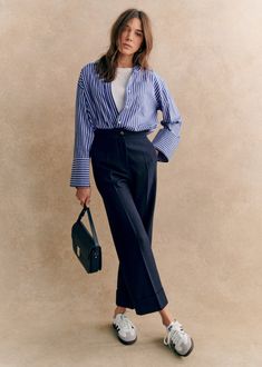 Ankle-length trousers;Turn-up at bottom of leg;Italian pockets and single welt pockets with button on back;Marked pleats front and back;Zip and button closure;Inside leg length 66 cm / 26 in (for all sizes) Chic Wide Leg Dress Pants With Concealed Placket, Modern Daywear Bottoms With Pockets, Modern Bottoms With Pockets For Daywear, Tailored Bottoms With Button Closure For Business Casual, Tailored Bottoms With Button Cuffs For Office, Spring Formal Office Chic Bottoms, Chic Tailored Bottoms For Work, Office Chic Formal Bottoms For Spring, Wide Leg Office Pants With Concealed Placket