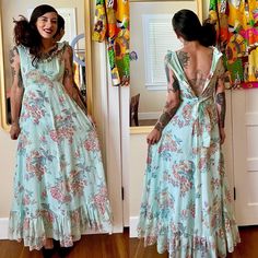 "Wow is this dress a dream or what? Incredible gauze cotton floral with a ruffle neckline and tiered hem, attached sash belt, and back zipper. By Patty O'Neil for 5*7*9 shops!  Bust: 32\" Waist: 26\" empire and under  Hips: 40\" Length: 58\" Model is 5'7\" and 115 lbs with measurements of 30x24x34. This fit like a dream but we forgot to zip up the back, our apologies!" Vintage Flowy Dress With Ruffle Hem, Vintage Ruffled Maxi Dress For Garden Party, Vintage Maxi Dress With Ruffles For Garden Party, Vintage Beach Dresses With Ruffle Hem, Vintage Ruffled Maxi Dress For Spring, Vintage Ruffle Maxi Dress For Spring, Vintage Beach Dress With Ruffle Hem, Spring Vintage Ruffled Maxi Dress, Vintage Sleeveless Maxi Dress For Garden Party