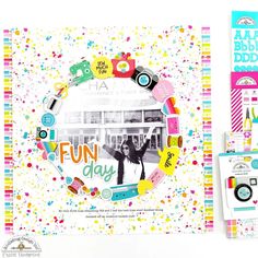 a scrapbook with the words fun day on it and an image of a camera