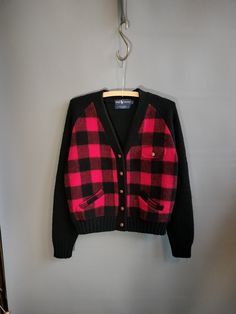 "1980s Ralph Lauren sweater-jacket in a very 1930s-style cut and design. Almost a 1930s repro.  excellent thick wool knit, fully-fashioned sweater, with a blanket-wool front in a true red and black buffalo plaid (color most accurate in second photo).  REAL leather knot buttons listed as a unisex sweater, but this does close the women's-way--men's is left-over-right and this is right-over-left. wearable by either gender!  raglan sleeves real pockets unstretched meaurements: 42\" chest (has stretc Vintage Fall Sweater For Cold Weather, Retro Plaid Sweater For Fall, Plaid Wool Sweater For Winter, Vintage Fall Sweater With Pockets, Vintage Sweater With Pockets For Fall, Vintage Wool Sweater For Fall, Classic Plaid Long Sleeve Cardigan, Vintage Wool Cardigan With Pockets, Classic Plaid Sweater For Fall