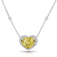 12.31 CT Heart Shaped Yellow Sapphire with round brilliant cut diamonds 1.17 carats set in handmade platinum pendant. Diamond Heart Cut Necklace With Prong Setting, Brilliant Cut Diamond White Solitaire Necklace With Heart Pendant, Diamond White Solitaire Necklace With Brilliant Cut Heart Pendant, Heart Cut Single Diamond Platinum Jewelry, Formal Heart Cut Diamond Necklace, Heart Cut Solitaire Diamond Necklace Vvs Clarity, Brilliant Cut Cubic Zirconia Heart Pendant Necklace, Formal Brilliant Cut Diamond Heart Pendant Necklace, Formal Brilliant Cut Diamond Necklace With Heart Pendant