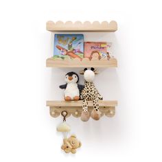 two wooden shelves with stuffed animals on them