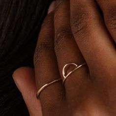 The Jude Ring is dainty and plain like our Jane ring, but a little thicker. A simple, minimalist band, the Jude Ring is designed to be worn as a timeless layering piece. Dainty Initial Ring With Round Band For Everyday, Dainty Everyday Initial Ring With Round Band, Simple Stackable Initial Ring For Everyday, Adjustable Minimalist Rings For Everyday Wear, Dainty Everyday Initial Ring With Simple Design, Gold Minimalist Initial Ring With Round Band, Minimalist Stackable Initial Ring For Promise, Minimalist Stackable Initial Promise Ring, Minimalist 14k Gold Initial Ring For Promise