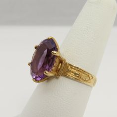 Estate 14k yellow gold large amethyst ring size 6.5. a 15mm by 10mm amethyst stone. great shape. no chips or damage. 4 grams. good size cocktail ring. Amethyst Cocktail Ring, Poison Ring, Baby Rings, Amethyst Gem, Purple Band, Antique Engagement, Wide Band Rings, Diamond Rings Bands, Antique Engagement Rings