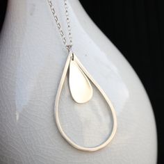 raindrop necklace rainy day minimalist modern jewelry Modern Handmade Teardrop Jewelry, Modern Teardrop Pendant Necklace For Everyday, Modern Everyday Teardrop Pendant Necklace, Modern Teardrop Drop Earrings For Everyday, Minimalist Everyday Dangle Drop Necklace, Everyday Sterling Silver Teardrop Pendant Necklace, Elegant Dangle Jewelry For Everyday Use, Minimalist Teardrop Pendant Drop Earrings For Everyday, Minimalist Teardrop Pendant Drop For Everyday