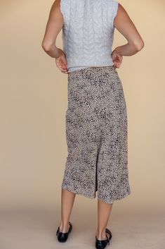 Adorned with a dainty print, this skirt brings a touch of feminine charm to any occasion. Whether you're dressing up for a special night out or keeping it casual, this skirt's timeless cut and pattern makes for the perfect style companion. slight high-low elastic waist unlined darkolivegreen (leopard print) // paired with a sweater coming soon saddlebrown (leopard print) // paired with the edinburgh cable knit sweater vest, the lydia denim jacket, + annette ballet flats in black black // paired Spring Ankle-length Relaxed Skirt, Non-stretch Lined Midi Skirt, Athleisure Mom, Leopard Print Relaxed Midi Skirt, Cable Knit Sweater Vest, Readable Fonts, Clogs Heels, Invert Colors, Knit Sweater Vest