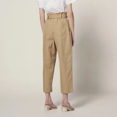 Sandro Women’s Pants Belted High-Waisted Pants 100% Cotton Loose Fit Topstitching On The Waistband Sandro Logo Engraved On The Buckle Of The Belt Pleats At The Waist Two Slanted Pockets On The Front And Two Patch Pockets On The Back Model Is Wearing A Size 36/Uk 8/Us 26 Inseam Lenght: 37.5" Inseam Lenght: 25" Reference : P6517e Main Fabric: 100% Cotton Buckle: 100% Zamac Belt Lining: 100% Cotton Pocket Lining: 100% Cotton Belted Beige Trousers, Tailored Beige Pants With Belt Loops, Belted High-waisted Pants For Spring, Beige Wide Leg Pants For Work With Belt Loops, Elegant Belted Cotton Pants, Spring High-waisted Belted Pants, High Waist Beige Belted Pants, Beige Straight Leg Belted Pants, Belted Straight Leg Beige Pants