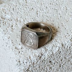 This Vintage Square Monogram Initial Signet Ring was crafted with time and care, handmade from sterling silver and oxidized to add character. Each ring is then individually worn and hammered to give it a rugged aesthetic and vintage feel--forging the charm that it was crafted many years before its time. Handcrafted/handmade from sterling silver with a clean vintage feel. The perfect gift! A gift for your boyfriend or girlfriend or yourself :) This etched for style with its well-worn design - nei Symbolic Signet Ring With Engraving For Promise, Symbolic Stamped Signet Ring In Sterling Silver, Symbolic Stamped Sterling Silver Signet Ring, Symbolic Sterling Silver Stamped Signet Ring, Symbolic Engraved Signet Ring As Promise Ring, Symbolic Engraved Signet Ring For Promise, Handmade Sterling Silver Promise Signet Ring, Handmade Sterling Silver Signet Ring For Promise, Vintage Stamped Initial Ring For Anniversary