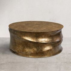 Sophisticated style with this rustic, modern farmhouse coffee table, used before a sofa or couch. Striking a round silhouette, the thick tabletop features antique brass - an elegant stage for displaying everything from remotes and coasters to trays of appetizers and drinks. Crafted of resin in an antique brass finish, the whole set in one piece offers added support and stability. This coffee table is an easy way to add a touch of vintage style to any apartment, dorm, or forever home. | NEWWORLDD Speakeasy Coffee Table, Round Drum Coffee Table, Modern Farmhouse Coffee Table, Farmhouse Coffee Table, Mood Board Interior, Rustic Modern Farmhouse, Apartment Dorm, Food Pantry Organizing, Drum Coffee Table